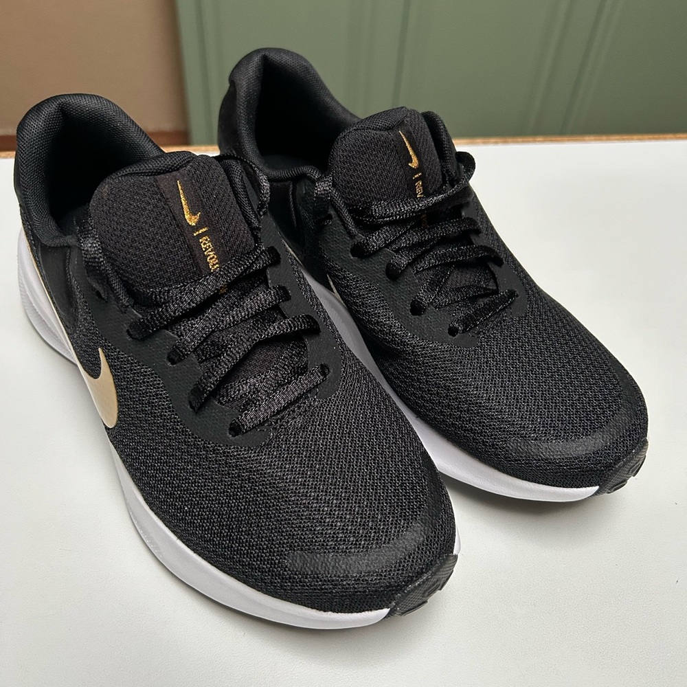Nike revolution brand new